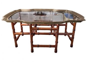 Mid-century Inspired Brass/Copper Trimmed Glass Top Cocktail Table With Bamboo Style Trestle Base