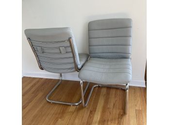 Pair MCM Chrome Tubular Chairs With Grey Faux Leather Upholstery