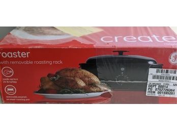 New In Box- GE  Enamel / Steel Turkey Roaster