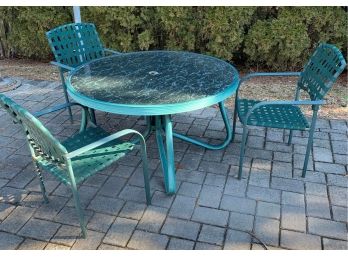 Rpund Patio Table And Three Chairs