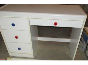 Small White Desk With Red And Blue Knobs