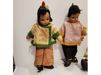 Two Antique Female Asian Dolls With Soft Plastic Faces And Cloth Bodies In Wonderful Local Fashion