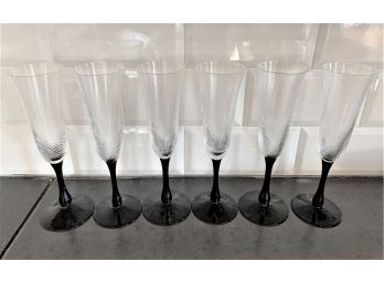 Six Fluted And Swirled Glass Champagne Flutes