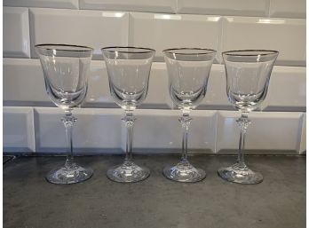 Four Onieda Crystal Wine Glasseswith Gilt Rims