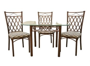 Dining Set With Glass Top And Four Matching Chairs