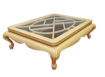 Washed Wooden Beveled Glass Top Coffee Table With An Asian Flair