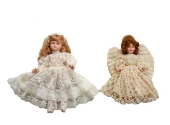 Two Angelic Antique Porcelain Dolls