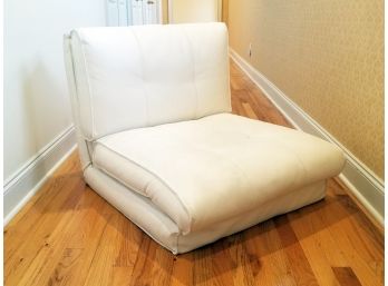 A White Leather Chair - Unfoldable Bed Combination