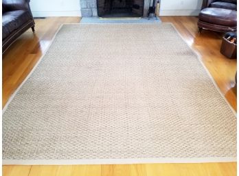 A Woven Seagrass Rug By Safavieh