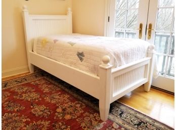 A White Painted Wood Twin Bedstead By Pottery Barn Kids