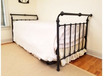 A Cast Iron Twin Size Bedstead With Trundle