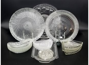 A Large Assortment Of Glass And Crystal Platters