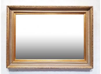 A Large Mirror In Gilt Wood Frame