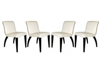 A Set Of 4 Mid Century Modern Vinyl Covered Dining Chairs