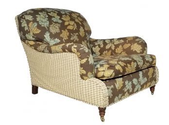 A Comfortable Upholstered Arm Chair By Ralph Lauren