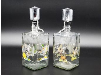 A Set Of Vintage Wildfowl Themed Pump Decanters