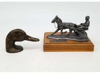 A Bronze Duck Head And Museum Horse Racing Cast