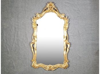 A Mirror In Ornate Gilt Wood Frame