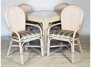 A Vintage Glass Top Dining Table And Set Of 4 Upholstered Rattan