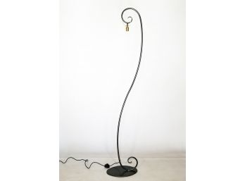 A Large Wrought Iron Standing Lamp