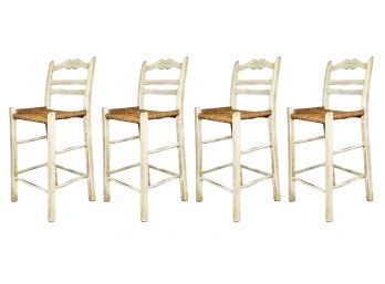 A Set Of 4 White Painted And Rush Seated Bar Stools By Pottery Barn