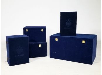 An Assortment Of Velvet Faberge Cases