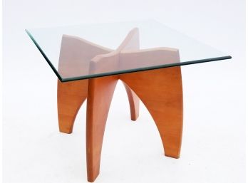 A Scandinavian Modern Glass Top Coffee Table