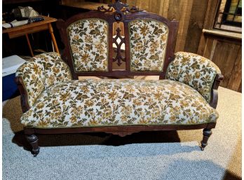 Handsome Carved Back With Center Crest Victorian Love Seat Or Setee Circa 1800's  With Decorative Fabric