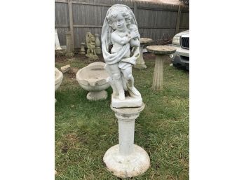 Cast Cement Draped Standing Cherub On A Pedestal