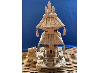 Incredibly Detailed Wooden Temple.  One Leg Missing But Still Stands Upright