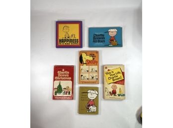 Vintage Charlie Brown And Snoopy Books Including The First Paperback Edition Of 'A Charlie Brown Christmas