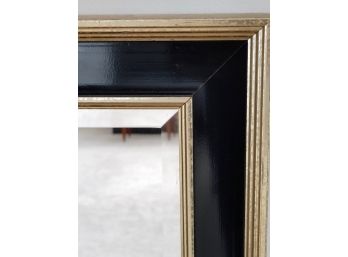 Beveled Glass Mirror With Black And Gold Frame