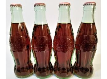 Four (4) Unopened Vintage Coca-Cola Bottles