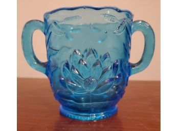 Vintage Pressed Blue Glass Handled Spooner 4 3/8' Tall With A Lighter Top Beaded Edging. Large Flower Blossoms