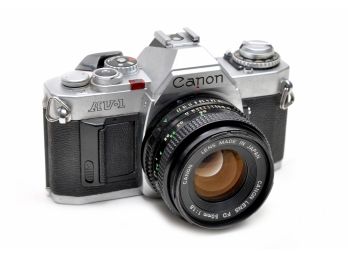 CANON AV-1 35MM SLR CAMERA W/FD 50MM 1.8 LENS