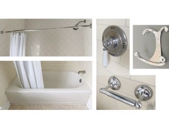 American Standard Porcelain Tub With Polished Chrome Faucet And Curtain Rod