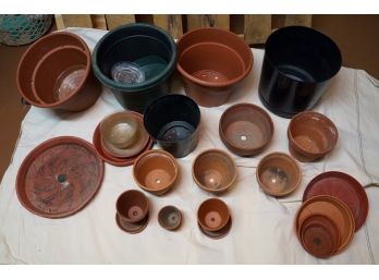 Assorted Pots And Saucers