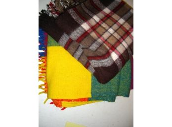 Two Plaid Throws, One Labeled Faribo