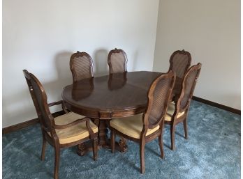 Dual Pedistal Dining Table With Two Removable Leafs & 6 Cane Back Chairs