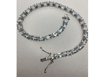 Oval Cut Tennis Bracelet Set In Sterling Silver  -  With Aqua Marine Stones