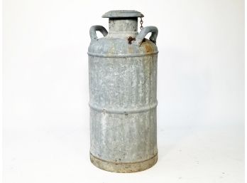 An Antique Galvanized Steel Milk Can