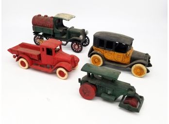 A Collection Of Vintage Cast Iron Toys