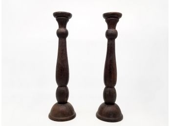 A Pair Of Large Carved Exotic Hardwood Candle Holders