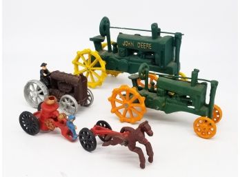 A Collection Of Vintage Cast Iron Toys