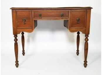 A Vintage Veneered Wood Writing Desk