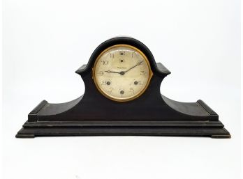 An Antique Waterbury Mantle Clock With Key