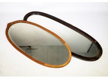 A Pairing Of Large Vintage Oval Mirrors