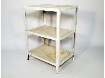 A Vintage Metal Medical Shelf