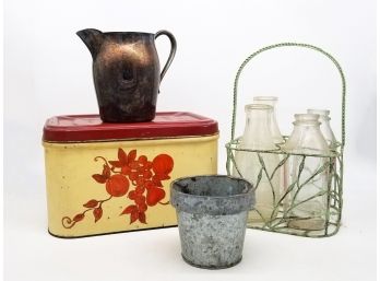 A Primitive Metal And Glass Decor Grouping