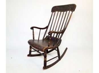 An Antique Hardwood Rocking Chair